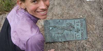 Jennifer Pharr Davis with Appalachian Trail marker