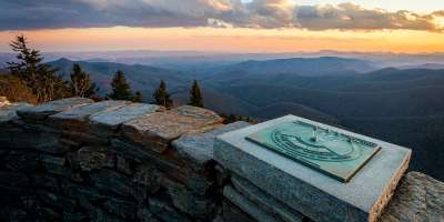 Sun is setting over mountain at the top of Devil's Courthouse vista