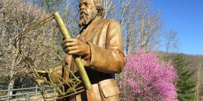 A statue of Olmstead lives at the NC Arboretum in Asheville