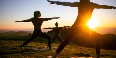 Yoga Class Held at Sunset on Mountaintop