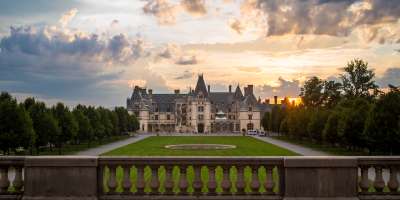 The sun sets behind the beautiful Biltmore in Asheville.