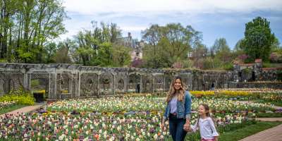 Mother and daughter standing in the gardens at Biltmore Estate