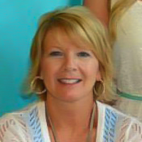 Pat Culp is a Caucasian female with chin-length blonde hair and blue eyes