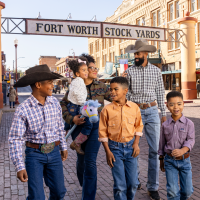 Family walking around fort Worth Stockyards