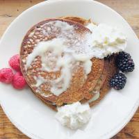 Buckwheat pancakes with berries and whipped cream from Delft Bistro
