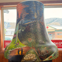 A painted mural on a bell