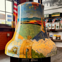 A painted mural on a bell