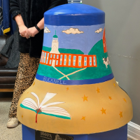 A painted mural on a bell