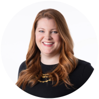 A headshot photo of Laura Connel smiling