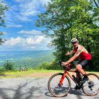 Picture of Dave From unPAved riding bike through beautiful countryside landscape