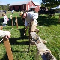 Picture of man working with old tools at Warrior Run Fort Freeland Heritage Days