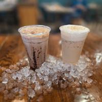 Two beverages sitting on counter at CycleUp Cafe