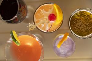 Top view of colorful cocktails, wine, and beer at The Captain's Table in Punta Gorda