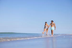 Couple enjoying the beach on Don Pedro Island