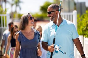 Man and woman with fishing pole at Laishley Marina in Punta Gorda, Florida