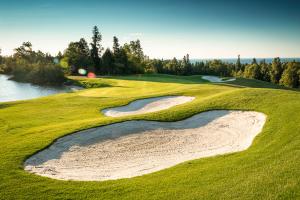 Golf course with lake views