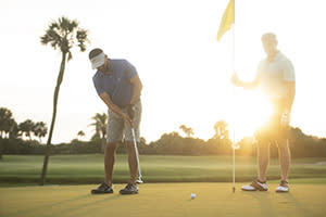 Family enjoying golf in Daytona Beach