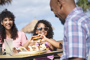 Family enjoying outdoor dining in Daytona Beach