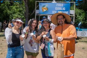 family members enjoy garlic ice cream at the Gilroy Garlic Festival