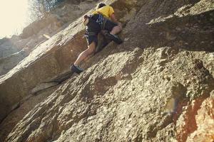 A mountain climber climbing near Golden, CO