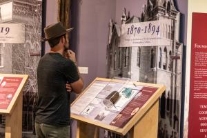 Man looking at an exhibit at the Greeley History Museum