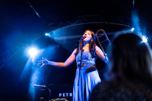 Nani Vazana singing on stage