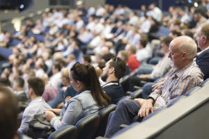 A conference plenary with delegates witting in the Riverside Theatre at the Perth Convention and Exhibition Centre