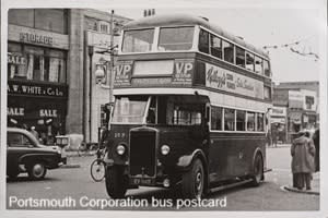 Black and white picture of a double decker bus with North End as the destination.