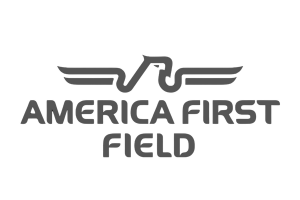 Stylized line art of an eagle with the words America First Field