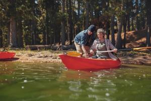 teaching a woman paddling