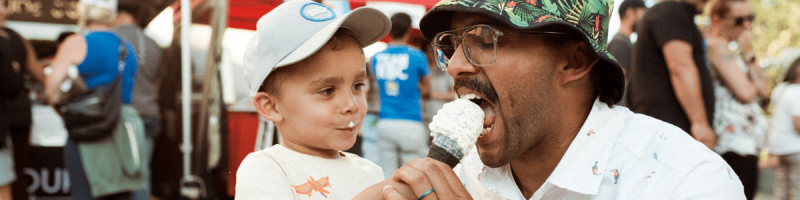 father and son eating ice cream