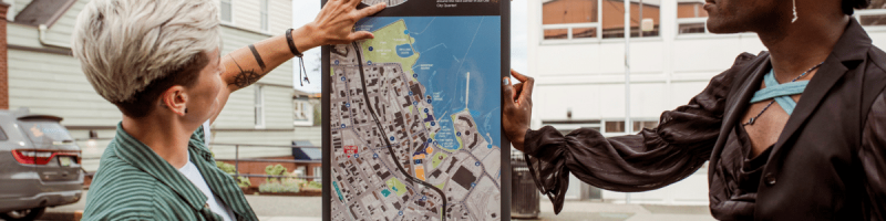 2 people looking at a map