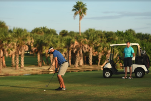 Man Golfing In Daytona Beach, FL