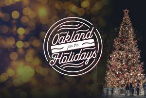 Oakland for the Holidays logo next to a lit up Christmas tree
