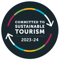 TIA Tourism Sustainability Commitment logo