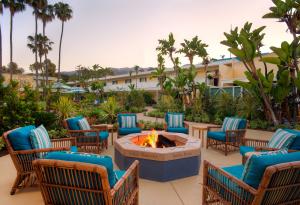 Firepit with lounge chairs in courtyard of Pavilion Hotel in Avalon