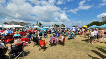 Crowds enjoying an outdoor festival along the Peace River in Punta Gorda/Englewood Beach