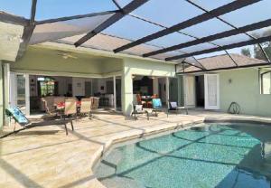 View of a lanai and pool at a vacation rental in Punta Gorda/Englewood Beach, FL