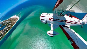 View of water and an island in Punta Gorda/Englewood Beach from a Suncoast Biplanes flight