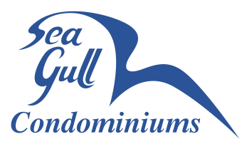 Royal blue logo with a thick line seagull drawing and italicized text reading "Sea Gull Condominiums"