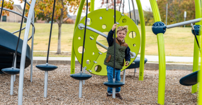Young kid playing on a playground