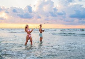 fishing-surf fishing-couple-beach