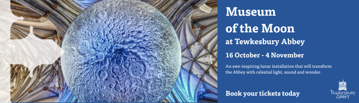 Tewkesbury Abbey Museum of the Moon banner advert.