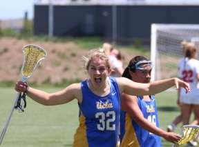 A UCLA Lacrosse player celebrates after a play at SCHEELS Stryker Sports Complex.