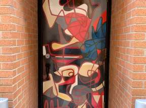 Hydrangeas in His Hand Alley Door by Aaron Jackson Bowman