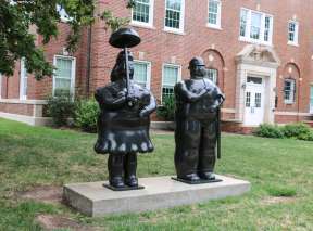 Woman with Umbrella and Man with Cane From The Martin H. Bush Outdoor Sculpture Collection in Wichita, KS
