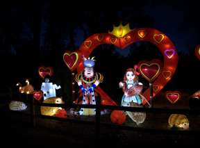 Asian lanterns in the shapes of the Queen of Hearts and Alice from Alice In Wonderland are lit during Wild lights