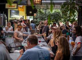 People order drinks at the bar at Central Standard Brewing