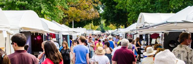 people checking out vendors at Fourth Street Festival during Labor Day in Bloomington