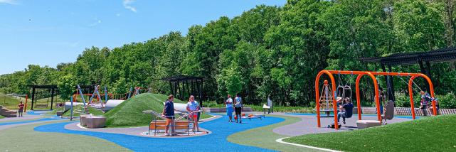 People playing at the Switchyard Park playground